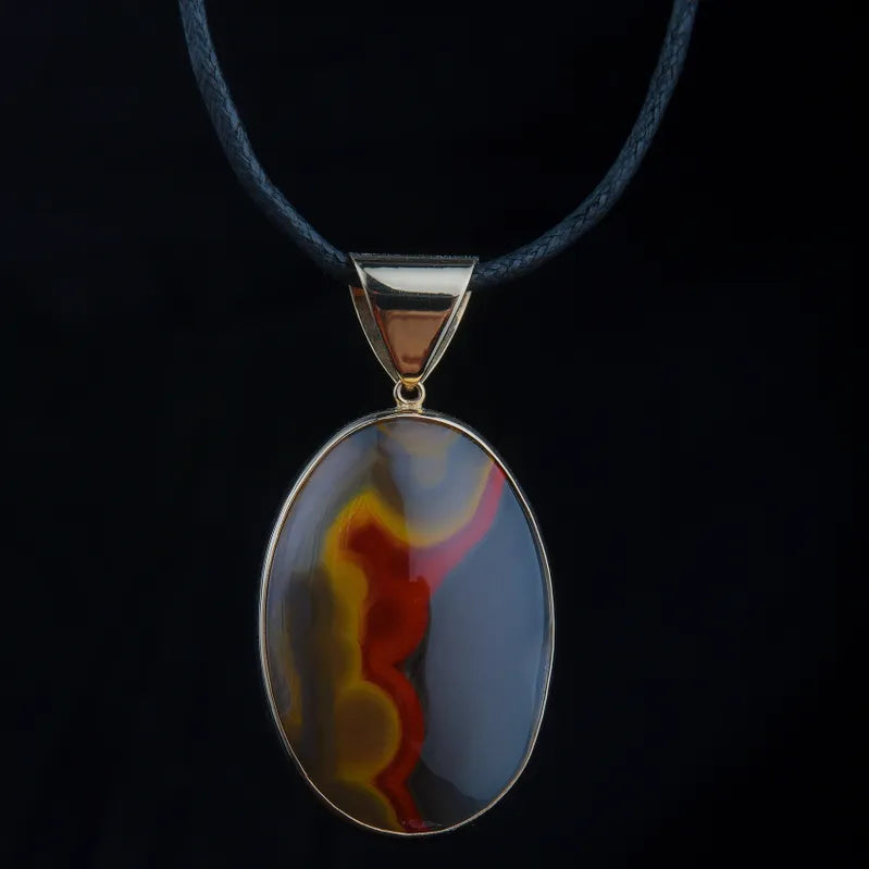 002 Oval Black/Red/Orange/Yellowish Kentucky Agate Pendant set in 14K gold